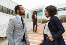 Business partners or colleagues staring at each other