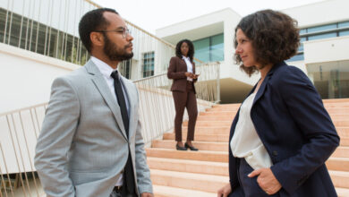 Business partners or colleagues staring at each other